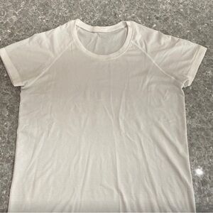 Lululemon white short sleeve swiftly tech shirt. Size 10.